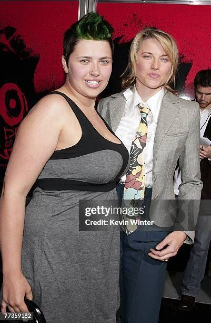Actress Lucy Lawless and her husband, producer Rob Tapert attend the