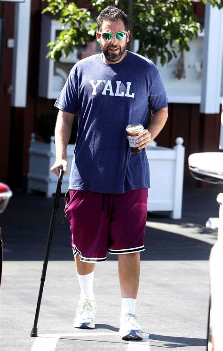 Adam Sandler walking with a friend in Santa Monica Los Angeles