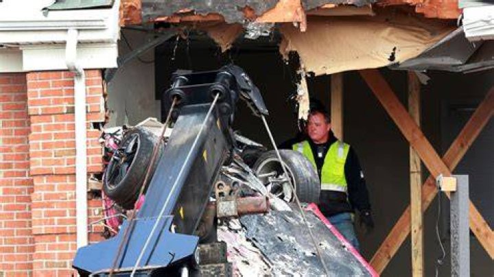 Airborne Porsche smashes into second storey of building US News Sky