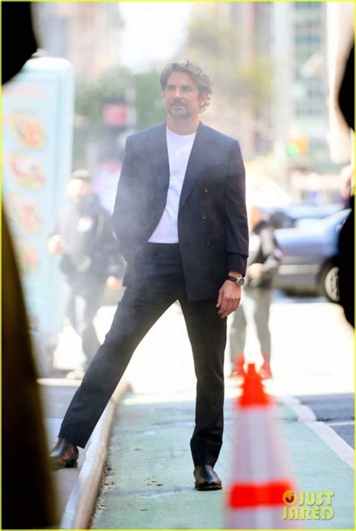 Bradley Cooper Steps Through Smoke While Filming A Commercial For Louis