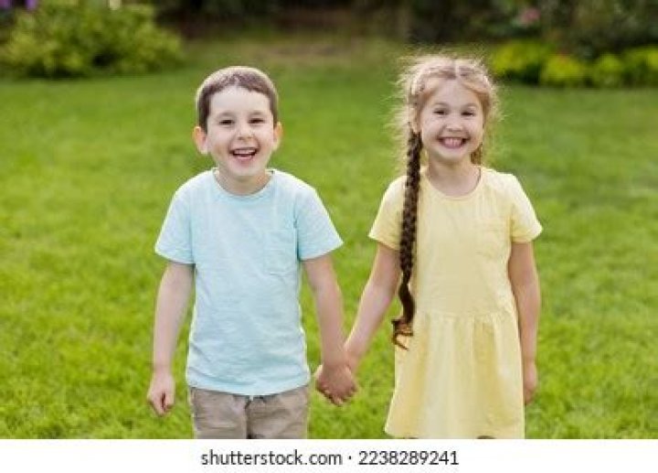 Brother and sister holding hands flat cartoon Vector Image
