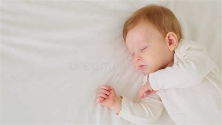 Child Sleeping with Hand Under His Cheek Stock Image Image of person
