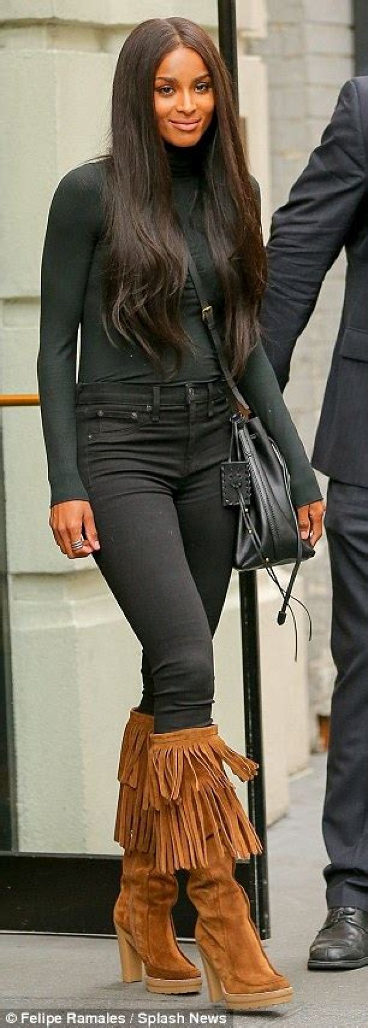 Ciara flaunts her 60lb weight loss in tight jeans and seethrough top