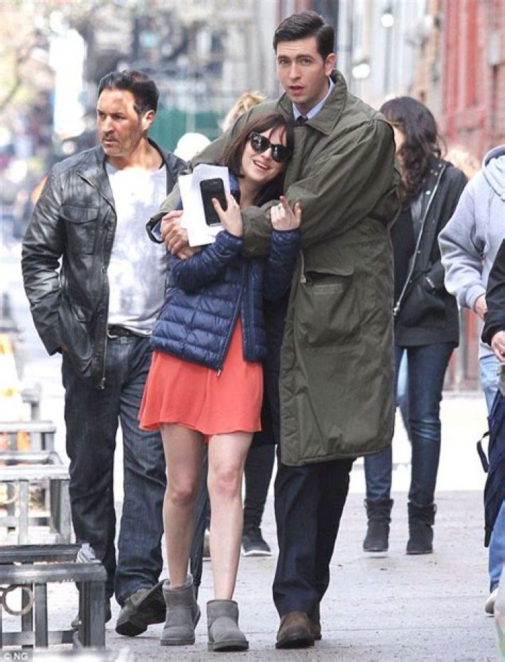 Dakota Johnson cozies up to costar Nicholas Braun on NYC set of new