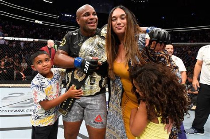 Download Daniel Cormier With Family Wallpaper