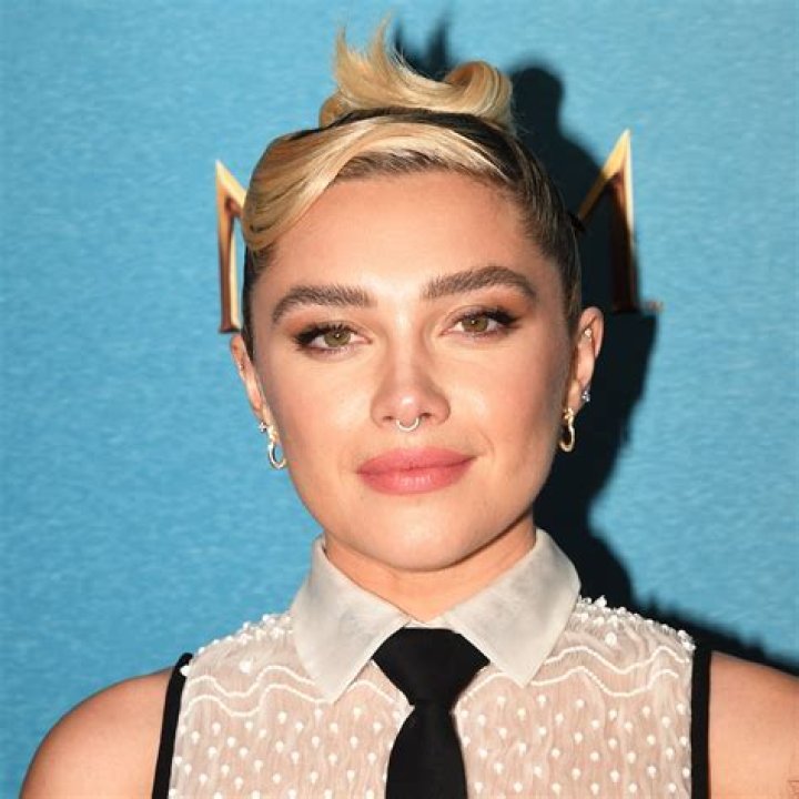 Florence Pugh wows in cheeky thighsplit midi dress in Paris with