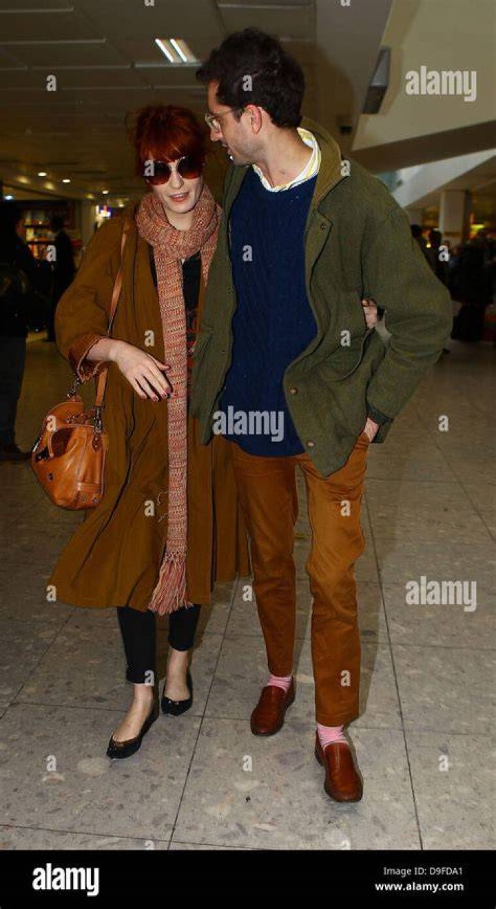 Florence Welch and her boyfriend have the look of love without the urge