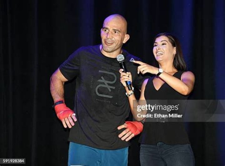Host and mixed martial artist Chael Sonnen arrive with his wife... News