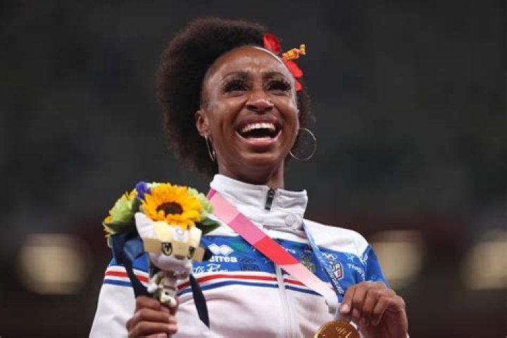 Jasmine CamachoQuinn wins first gold for Puerto Rico in track and field