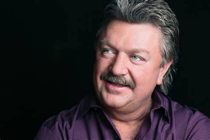 Joe Diffie's Daughter Sings His Song "Home" To Honor Her Dad After His