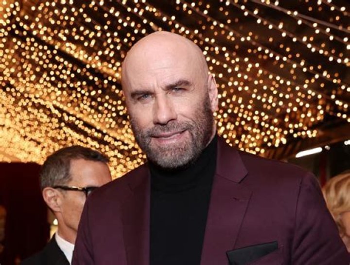 John Travolta Stars in Capital One Ad as Tony Manero Santa