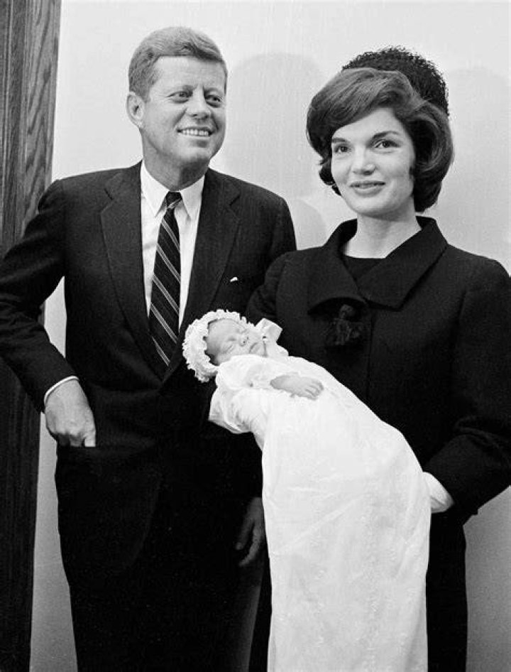 Kennedy, left, with his newlywed third wife, Joan McCarthy