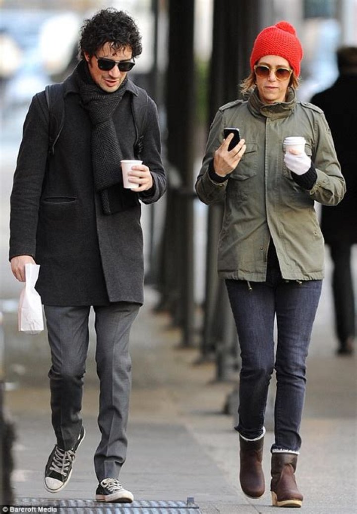 Kristen Wiig enjoys a stroll in the Big Apple with her rocker boyfriend