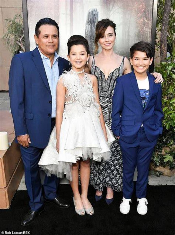 Linda Cardellini stuns in lowcut monochrome dress at Hollywood