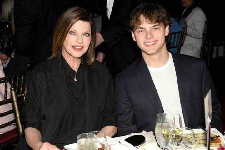Linda Evangelista and son Augustin twin in matching suits at 2nd Annual