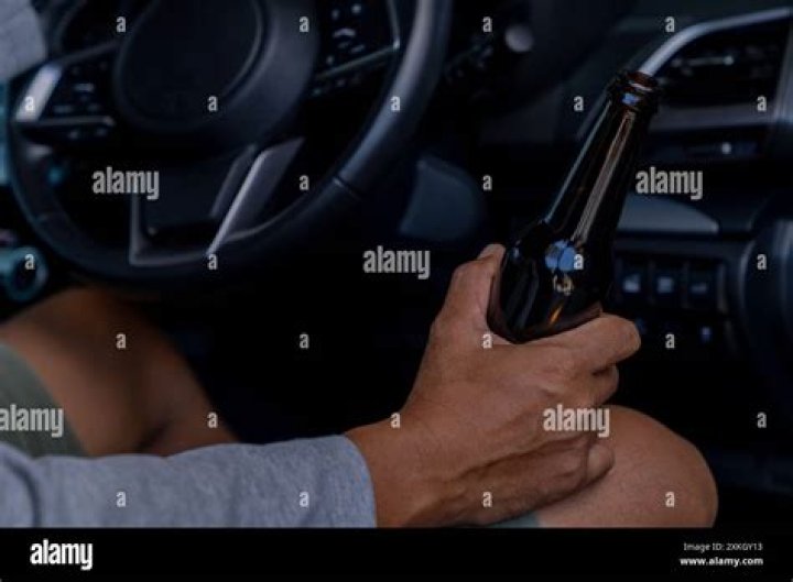 Man Drinking & Driving w/ Beer When using this image pleas&hellip; Flickr