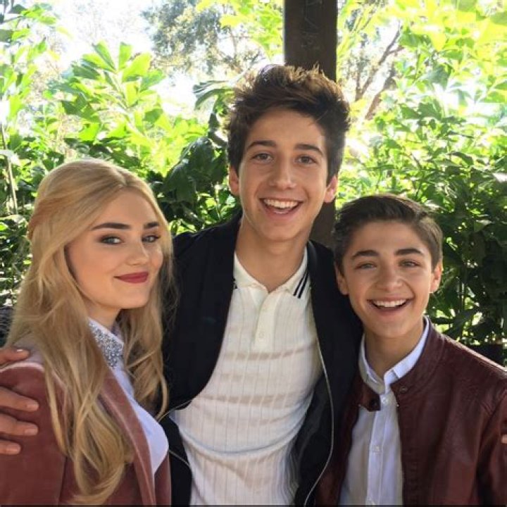 Meg Donnelly family through a magnifying glass mother and father