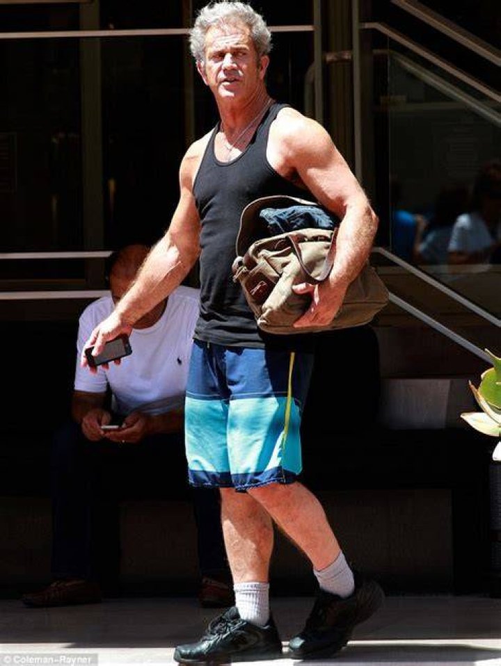 Mel Gibson, 58, shows off his bulging biceps after finishing up a