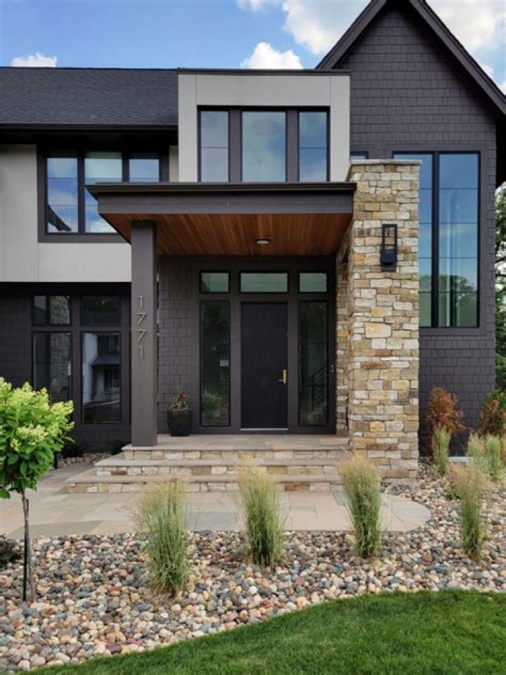 Modern exterior veneer stone home driveway gate design Rustic Buff