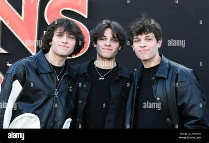 nick matt and chris sturniolo with a fan lets trip tour 2023 Tri Star