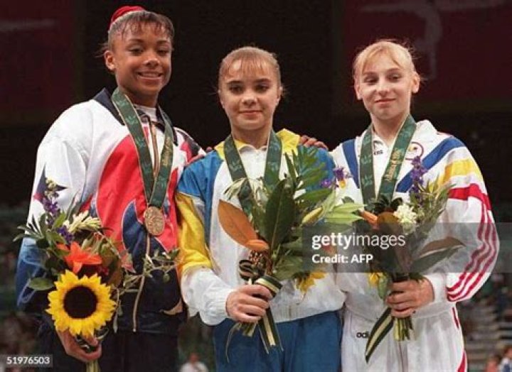 Olympic gold medalist Dominique Dawes with her husband Jeff Thompson