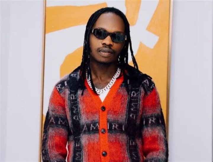 Photo of Naira Marley's mother in tears as lawyer explains her son's