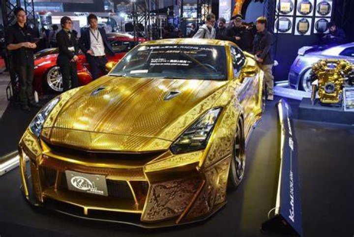 Photos 1 million gold car unveiled in Automechanika Dubai Arabian