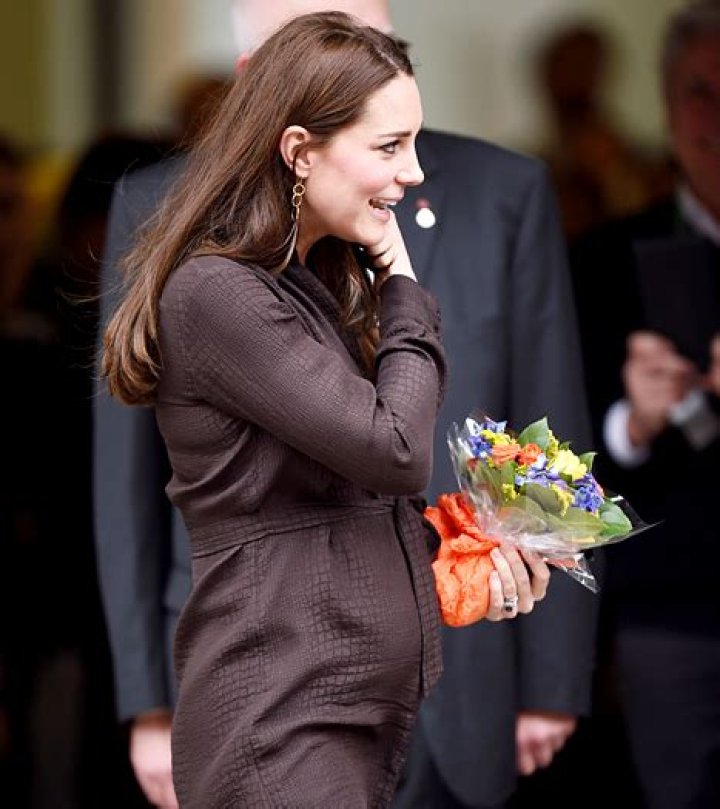 Pregnant Kate Middleton Visits Foster Care Center, Has Tea Bump Photo