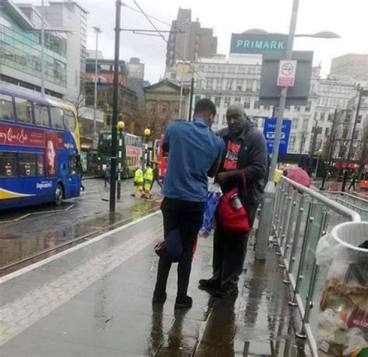 Purple Aki spotted in Manchester town centre touching bicep Daily Star