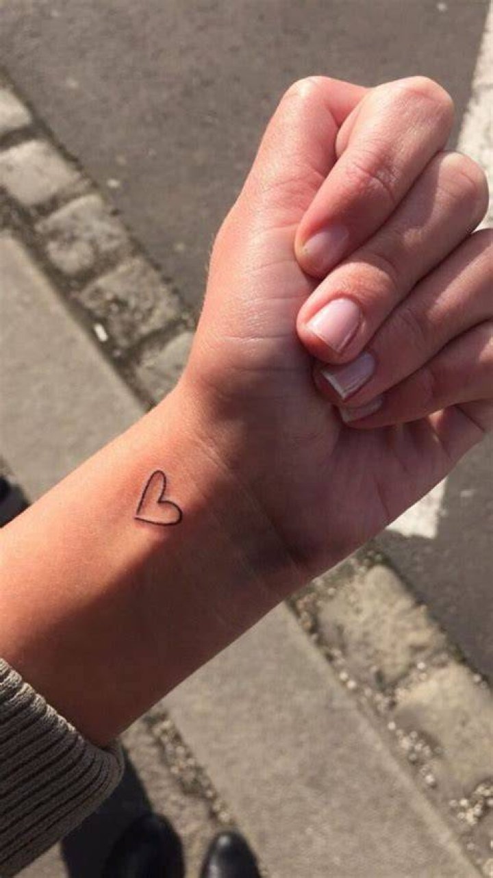 Small heart tattoo on wrist Inkage... Wrist tattoos, Small heart
