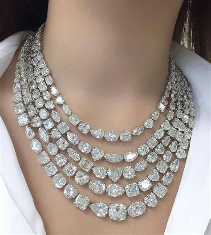 Trying on a necklace composed of 176 diamonds with a total weight of