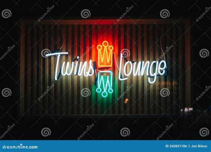 Twins Lounge Vintage Neon Sign at Night, in Greenpoint, Brooklyn, New