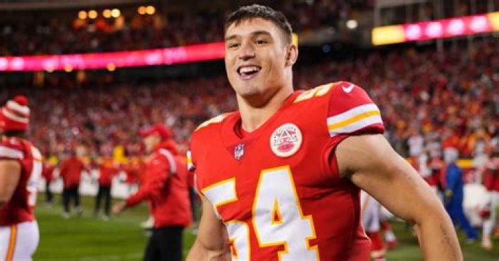 WATCH Leo Chenal jumps to top of Chiefs championship parade bus On3