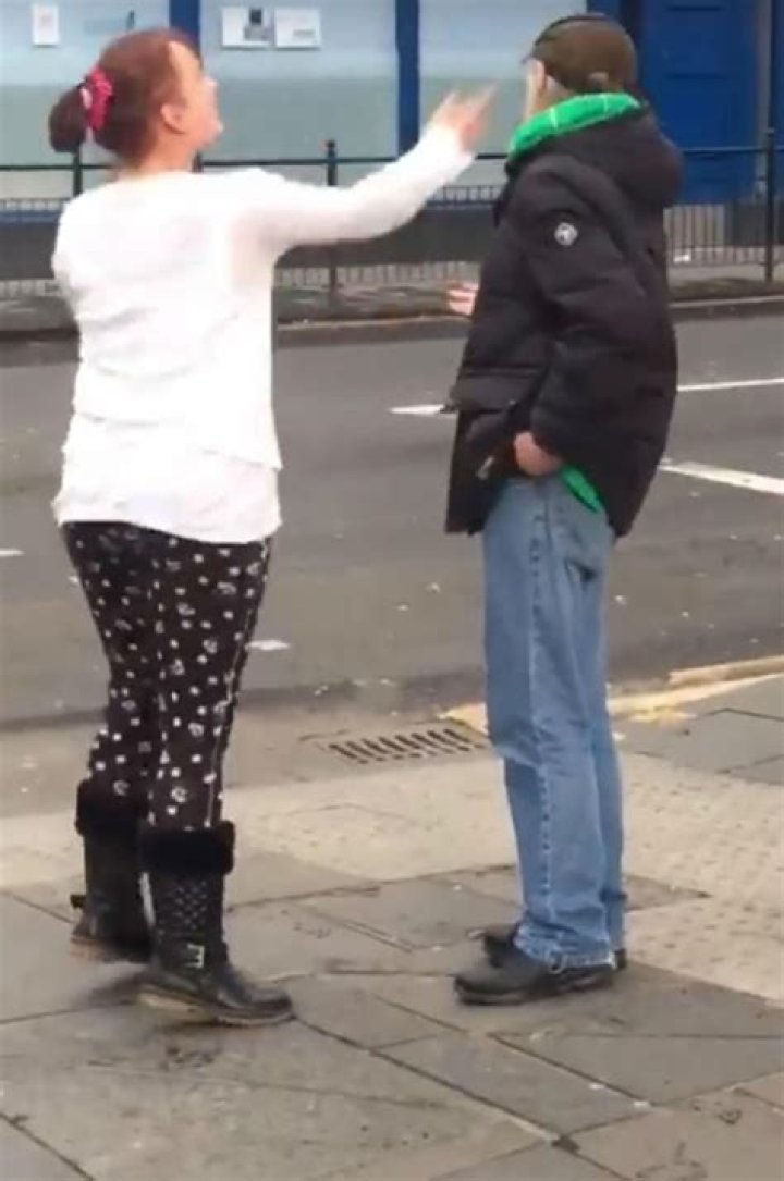 Woman viciously slaps and punches man during Glasgow street bustup in